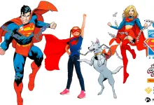 Child in blue shirt with red cape posing heroically between two Superman characters and a gray dog, all on a white background; event logos appear on the right edge (Superman Day 2026).