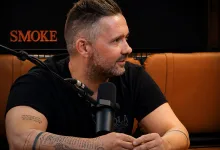 Man with Short Hair and Beard Speaks into a Microphone During a Podcast Seated at a Wooden Tablemaybe More Context Hablar Bien Tiene Premio 15 Hamburguesas Y 15 Dürüms Al Día Durante 15 Días Zaragozala   Qué Hacer En Zaragoza