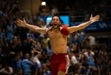 Male Athlete in Red Shorts Celebrates with Arms Raised in a Packed Arena Crowd Behind Him Shirtless and Triumphant Zaragozala | Agenda Cultural Ocio Y Planes En Zaragoza Zaragozala   Qué Hacer En Zaragoza