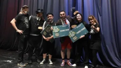 Seven People Stand on a Stage Smiling Holding Large Blue Award Plaques and Trophies After Winning a Prize Zaragoza   Qué Hacer En Zaragoza Zaragozala   Qué Hacer En Zaragoza