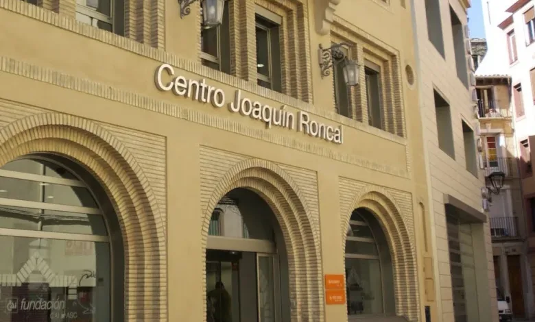 Facade of Centro Joaquín Roncal a Beige Brick Building with Arched Windows and a Prominent Sign Reading centro Joaquín Roncal Above the Entrance Zaragoza   Qué Hacer En Zaragoza Zaragozala   Qué Hacer En Zaragoza