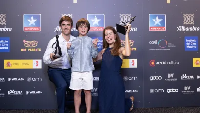 Three People Posing with Trophy Statues at an Awards Event in Front of a Logo filled Backdrop Martha G Ayerbe Gana El Premio Fugaz Mejor Dirección Novel Zaragozala   Qué Hacer En Zaragoza
