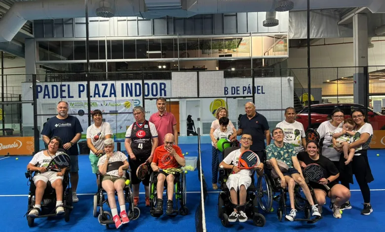 Group of People Including Several Wheelchair Users Posing for a Photo on a Blue Indoor Padel Court with a Large padel Plaza Indoor Sign in the Background Aspace Zaragoza Recauda 7425 Euros Con Su Torneo Solidario Zaragozala Qué Hacer En Zaragoza