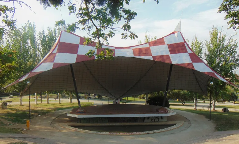 Outdoor Stage with a Red and white Checkered Canopy in a Park Setting Programa Completo De Las Fiestas De Torrero 2026 Zaragozala   Qué Hacer En Zaragoza