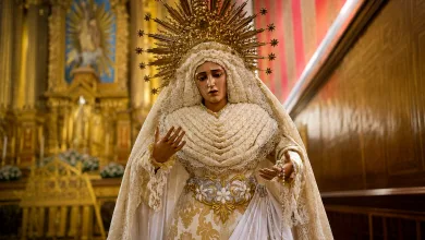 Statue of the Virgin Mary in an Ornate White Lace Gown and Gold Sunburst Crown Inside a Gilded Church Altar Exposición 75 Aniversario De La Virgen De La Fraternidad Zaragozala   Qué Hacer En Zaragoza