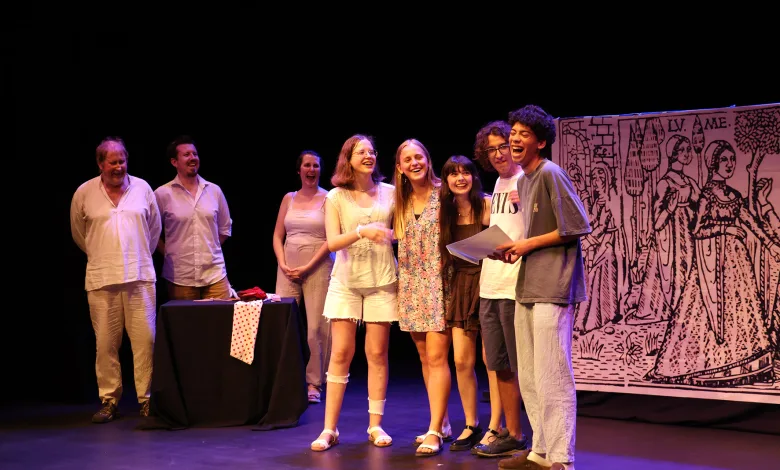 Eight Young Performers Stand in a Line on Stage Smiling a Table with a Polka dot Cloth and a Large Illustrated Backdrop Behind Them Zaragozala | Agenda Cultural Ocio Y Planes En Zaragoza Zaragozala Qué Hacer En Zaragoza