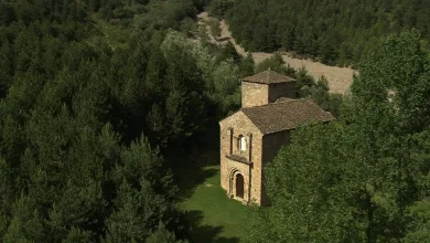 Stone Chapel with Arched Doorway in a Clearing Surrounded by Dense Evergreen Forest Santa María De Iguácel Reabre Con Visitas En Agosto Zaragozala Qué Hacer En Zaragoza