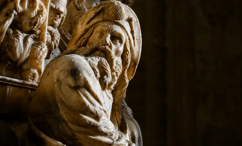 Close up of a Marble Statue Bearded Man with a Hood Lit from the Left Against a Dark Background Busto De Santiago Apóstol En El Pilar Fechas Y Visita Zaragozala Qué Hacer En Zaragoza