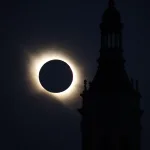 Solar Eclipse with a Bright Corona Behind a Dark Moon Silhouetted Church Tower on the Right Miles De Personas Observan El Eclipse Total En Zaragoza Zaragozala Qué Hacer En Zaragoza