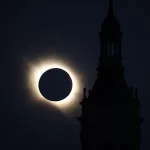 Solar Eclipse Behind a Silhouetted Church Tower with a Glowing Solar Corona Around the Dark Disk Miles De Personas Observan El Eclipse Total En Zaragoza Zaragozala Qué Hacer En Zaragoza