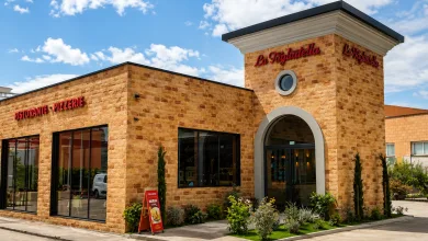 Exterior of La Tagliatella Italian Restaurant and Pizzeria Brick Façade with Large Windows and Arched Entrance Under a Blue Sky Sign Visible Above the Door La Tagliatella Abre Un Nuevo Restaurante En El Arrabal Zaragozala Qué Hacer En Zaragoza
