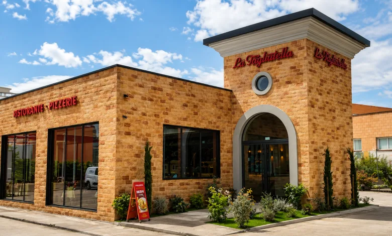 Exterior of La Tagliatella Italian Restaurant and Pizzeria Brick Façade with Large Windows and Arched Entrance Under a Blue Sky Sign Visible Above the Door La Tagliatella Abre Un Nuevo Restaurante En El Arrabal Zaragozala Qué Hacer En Zaragoza
