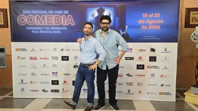 Two Men in Light Blue Shirts Pose with an Arm Around Each Other in Front of a Large Film Festival Banner Reading xxiii Festival De Cine De Comedia in Tarazona Y El Moncayo 2026 Poster Behind Them Zaragozala | Agenda Cultural Ocio Y Planes En Zaragoza Zaragozala   Qué Hacer En Zaragoza