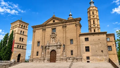 Brick Church with Two Towers and Grand Stairway Against a Bright Blue Sky Historic Architectural Facade Zaragozala | Agenda Cultural Ocio Y Planes En Zaragoza Zaragozala   Qué Hacer En Zaragoza